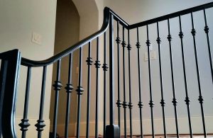 Wrought Iron Handrail on a banister being installed in !City!
